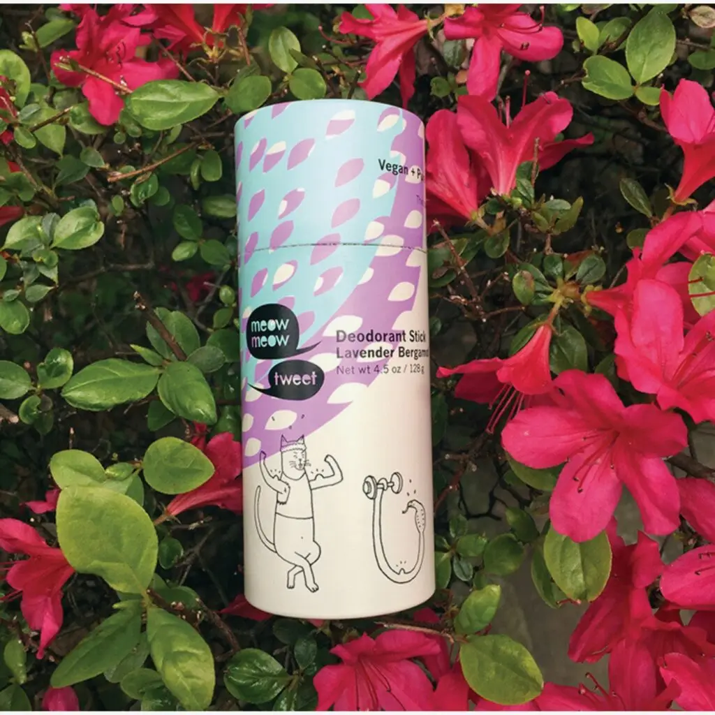 A cheerful photo of Meow Meow Tweet deodorants on a colorful backdrop