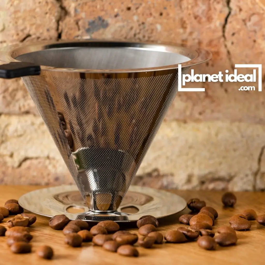 A close-up of a reusable coffee filter in action, brewing a fresh cup of coffee.