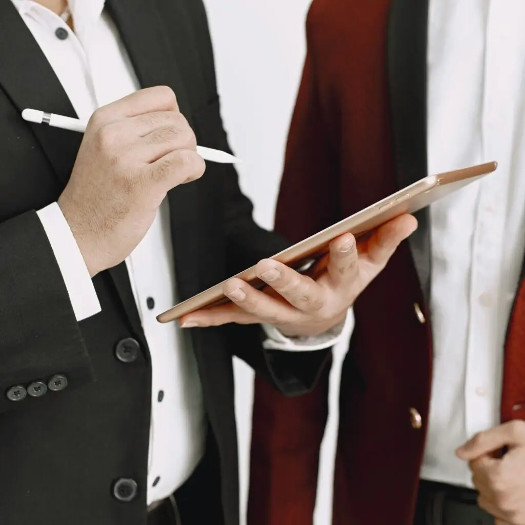 A person using a tablet for Note-taking