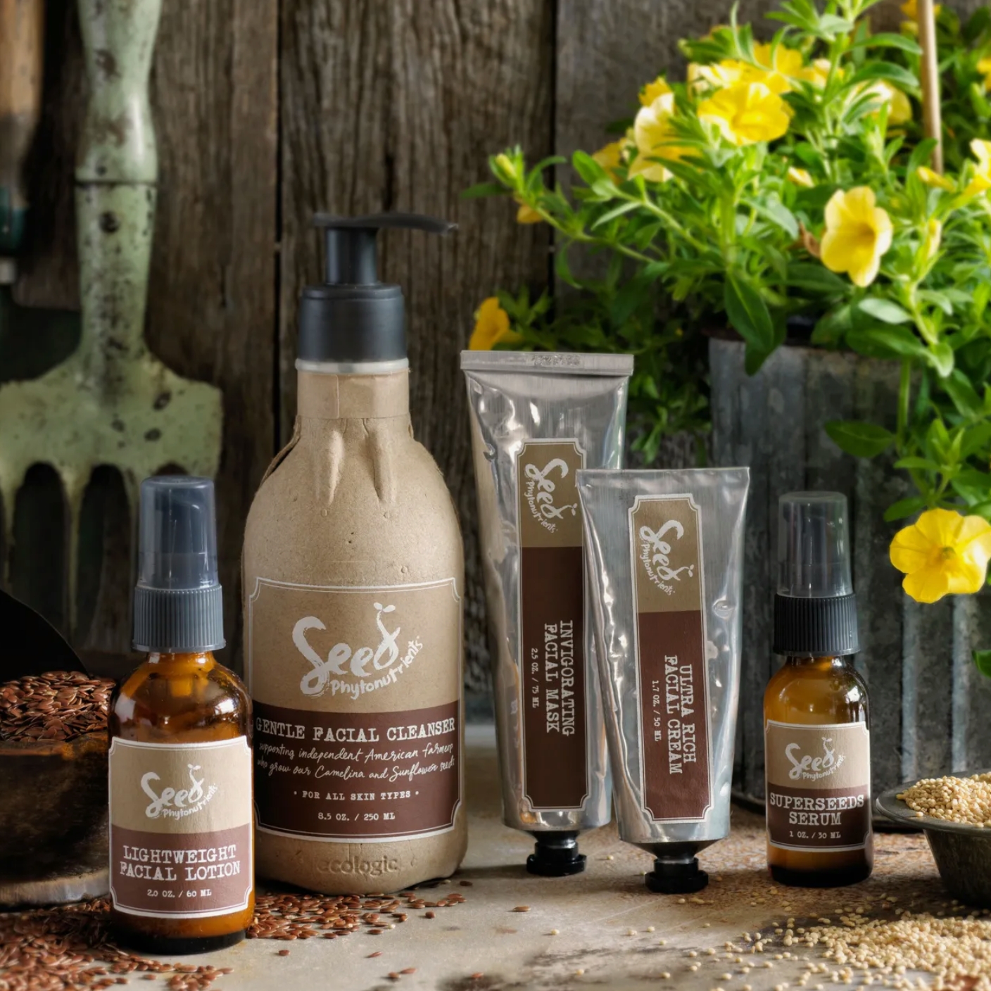A photo of Seed Phytonutrients products displayed alongside a small potted plant