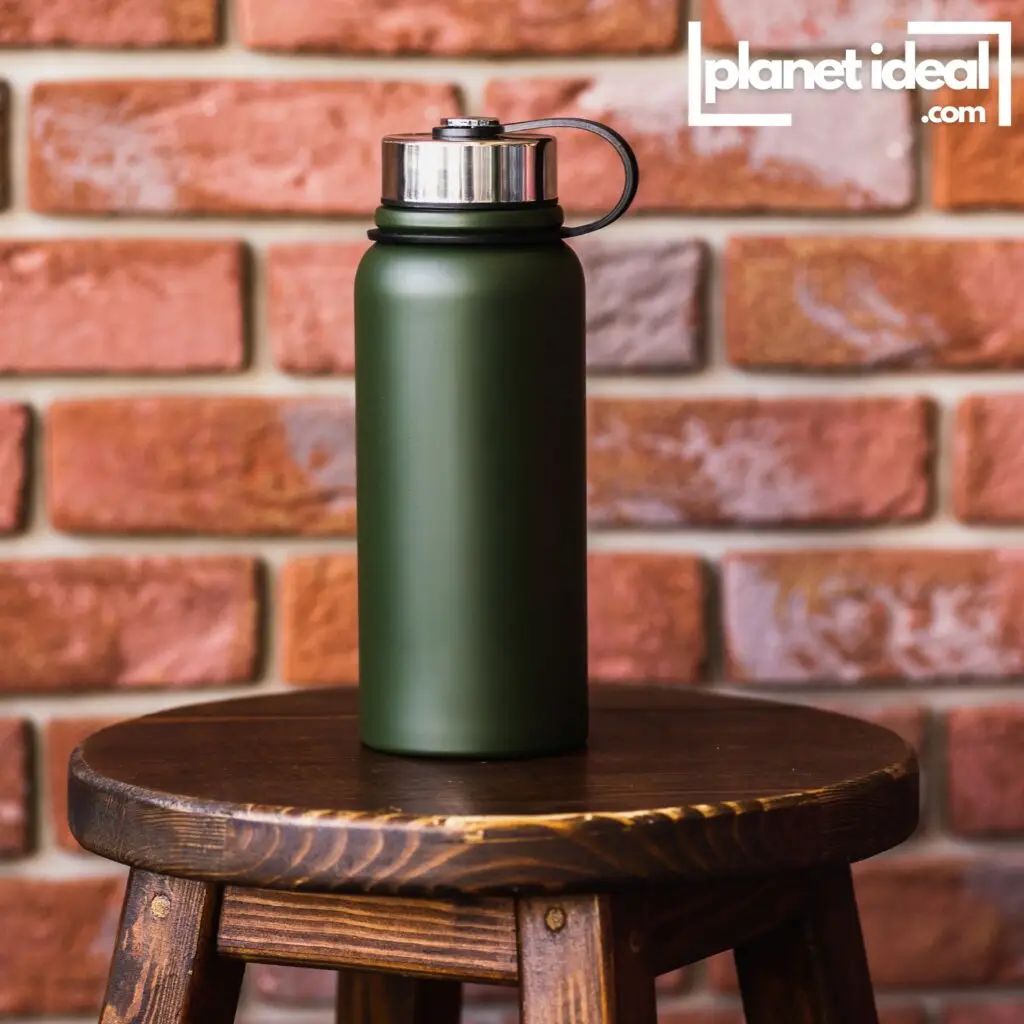 A serene image of a minimalist bedside table with a reusable water bottle, a plant, and natural sunlight streaming in through the window.