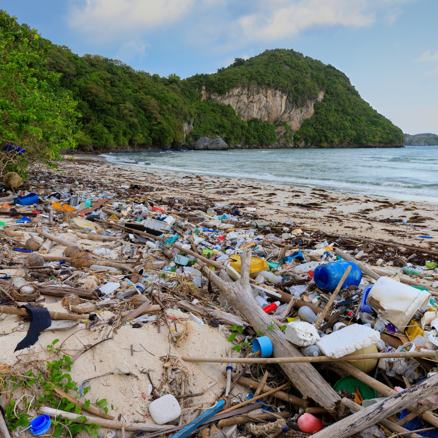 A striking image of a beach littered with plastic waste, juxtaposed with a clean, pristine shoreline