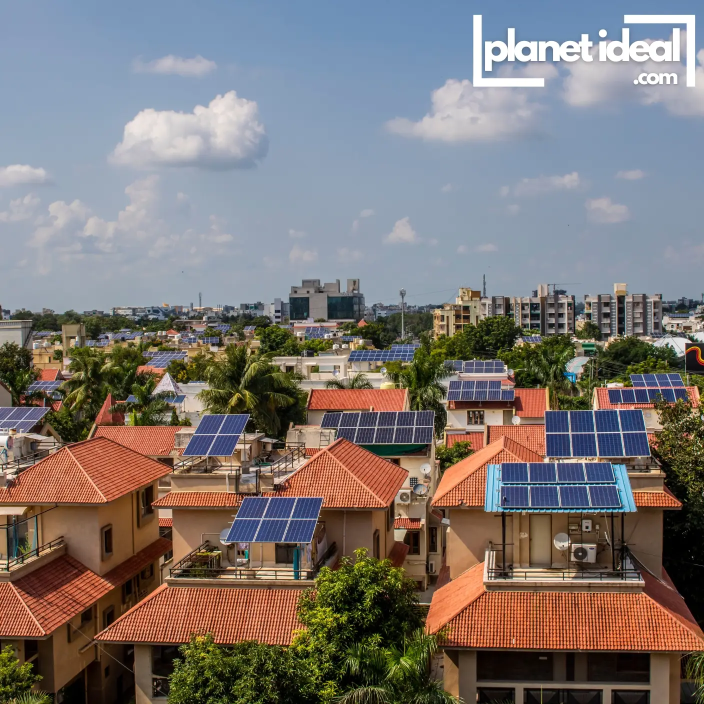 An aerial view of a modern, sustainable city with solar-paneled rooftops and urban gardens.