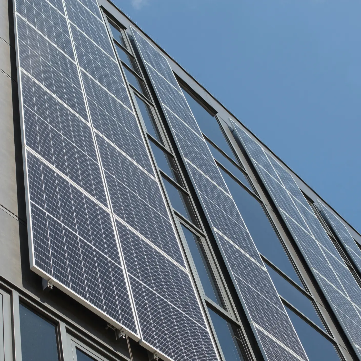 Office Building with Solar Windows allowing Light to pass through, but still generating Electricity