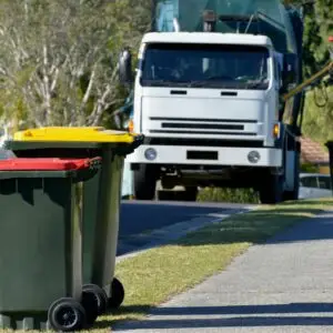 Recycling truck collecting bins