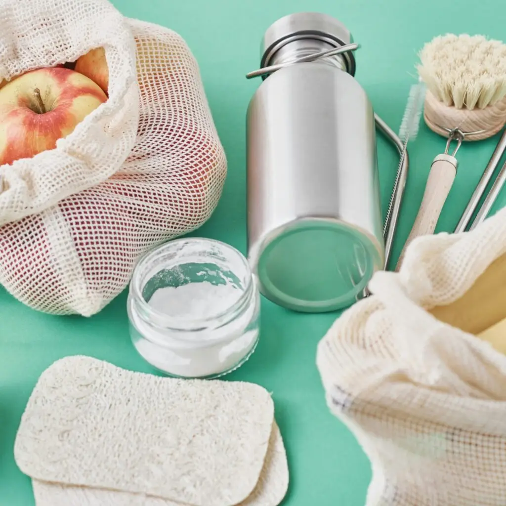 Tidy Kitchen Counter featuring reusable items like a stainless steel water bottle and bamboo brush