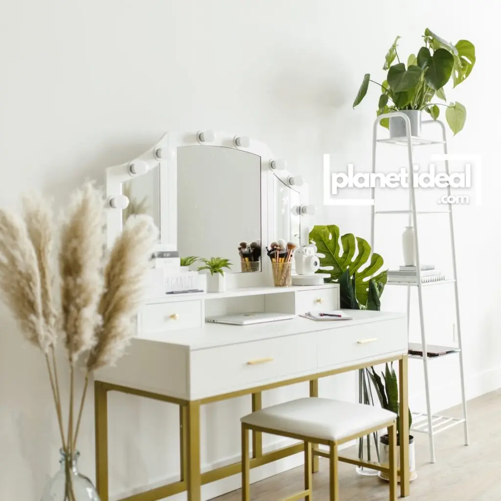A vanity setup featuring organic skincare bottles, plants, and a mirror reflecting natural light.
