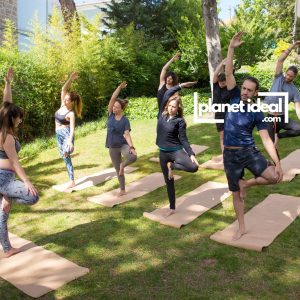 A yoga setup with an eco-friendly yoga mat and natural surroundings